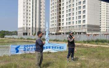 군산시 농민회, 통일쌀 모내기 행사 성황